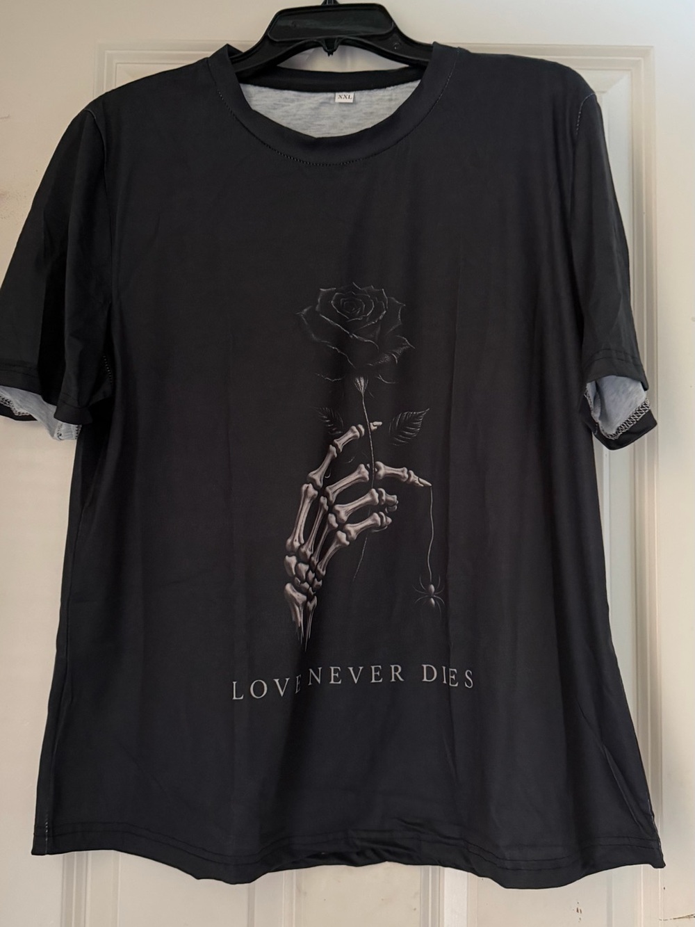 Target Black Graphic 'Love Never Dies' Short Sleeve Tee. It fits like XL